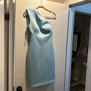 Beautiful powder Jovani one shoulder dress.  Worn once great condition